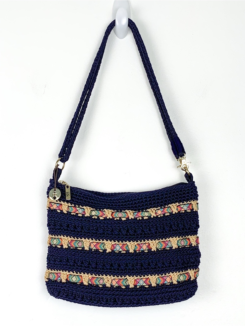The Sak crochet shoulder or crossbody bag navy blue with Aztec ribbon stripes